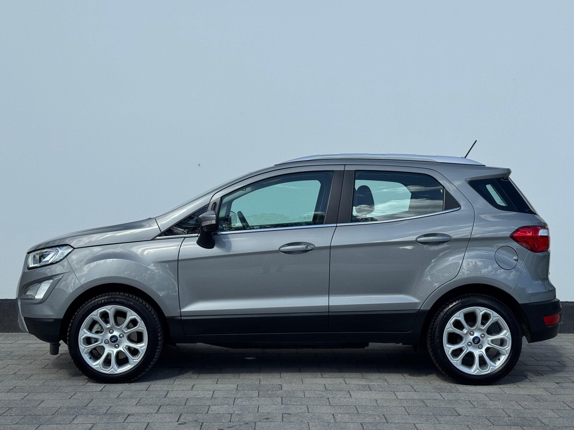 Ford EcoSport EcoBoost 125 pk Titanium | Trekhaak | Camera |, Gebruikt, Ecosport, Leder en Stof, Origineel Nederlands