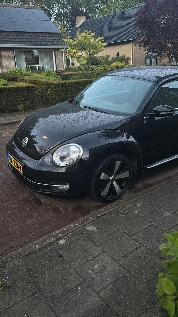 Volkswagen Beetle (Kever) 1.2 TSI 77KW BMT 2011 Zwart, Auto's, Volkswagen, Voorwielaandrijving, Beetle (Kever), 4 cilinders, 4 stoelen
