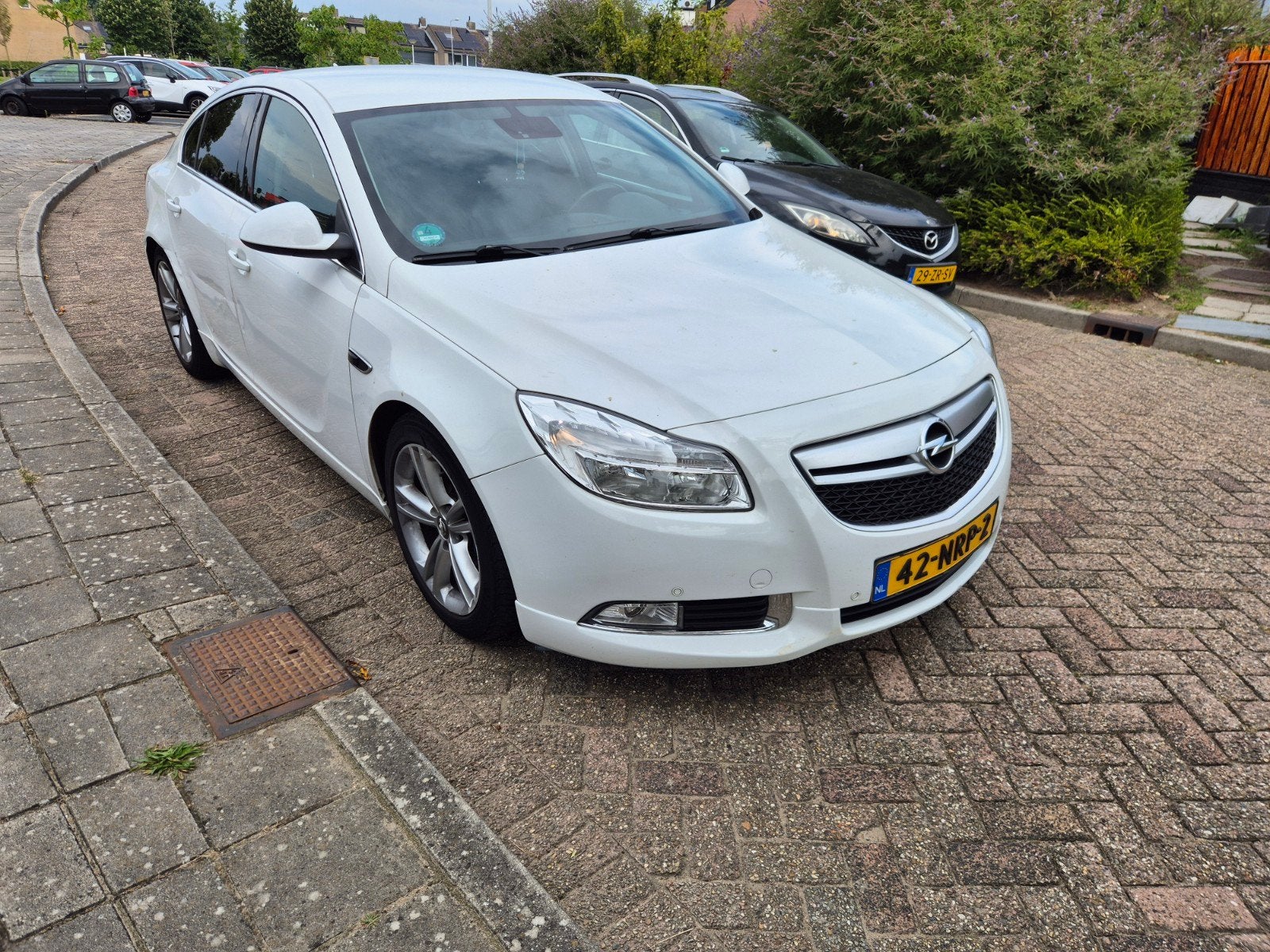 Opel Insignia 1.6 Turbo 132KW 5-DRS 2010 Wit, Auto's, Opel, Bluetooth, Zwart, 4 cilinders, 179 pk