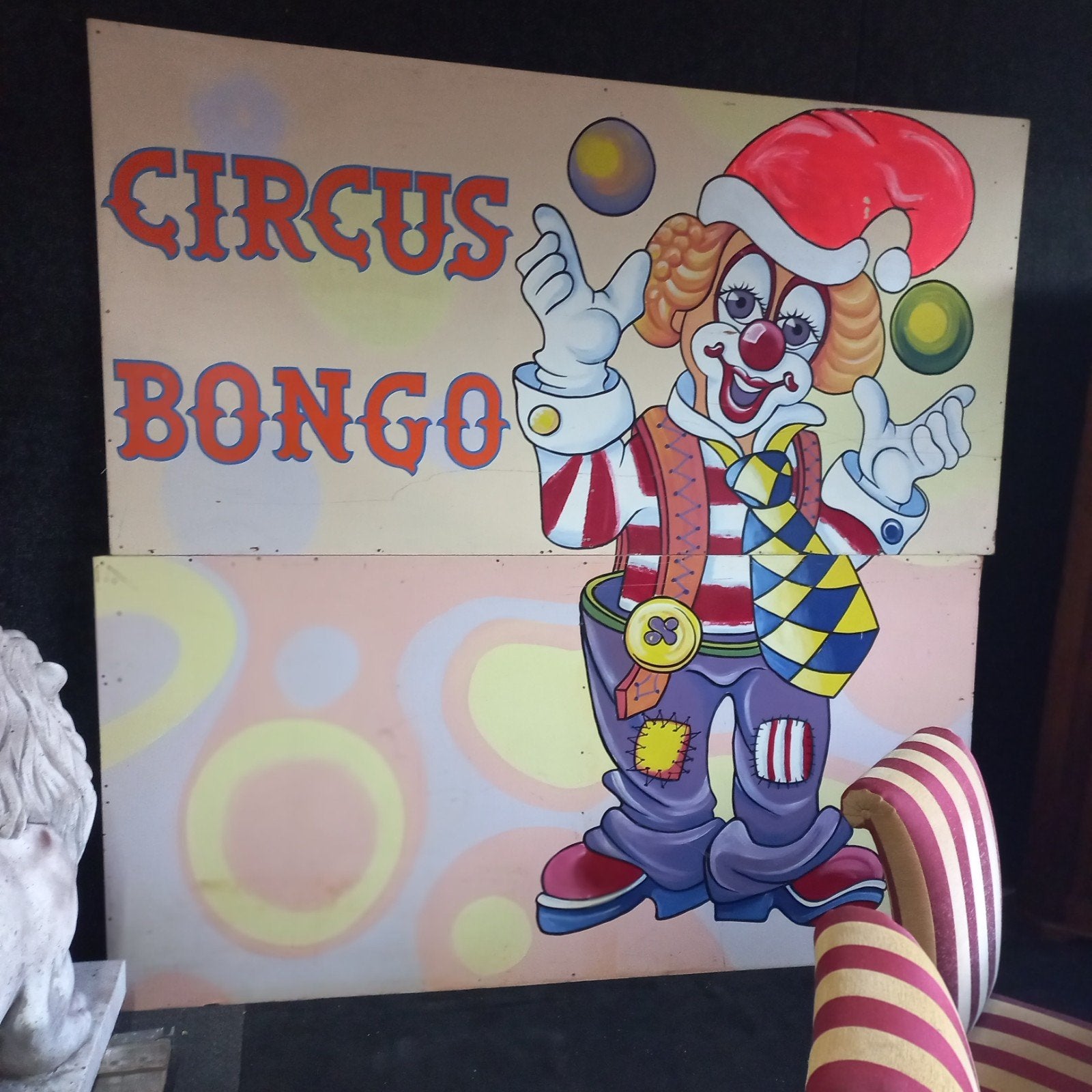 Handgeschilderd bord van cirkus Bongo, Ophalen