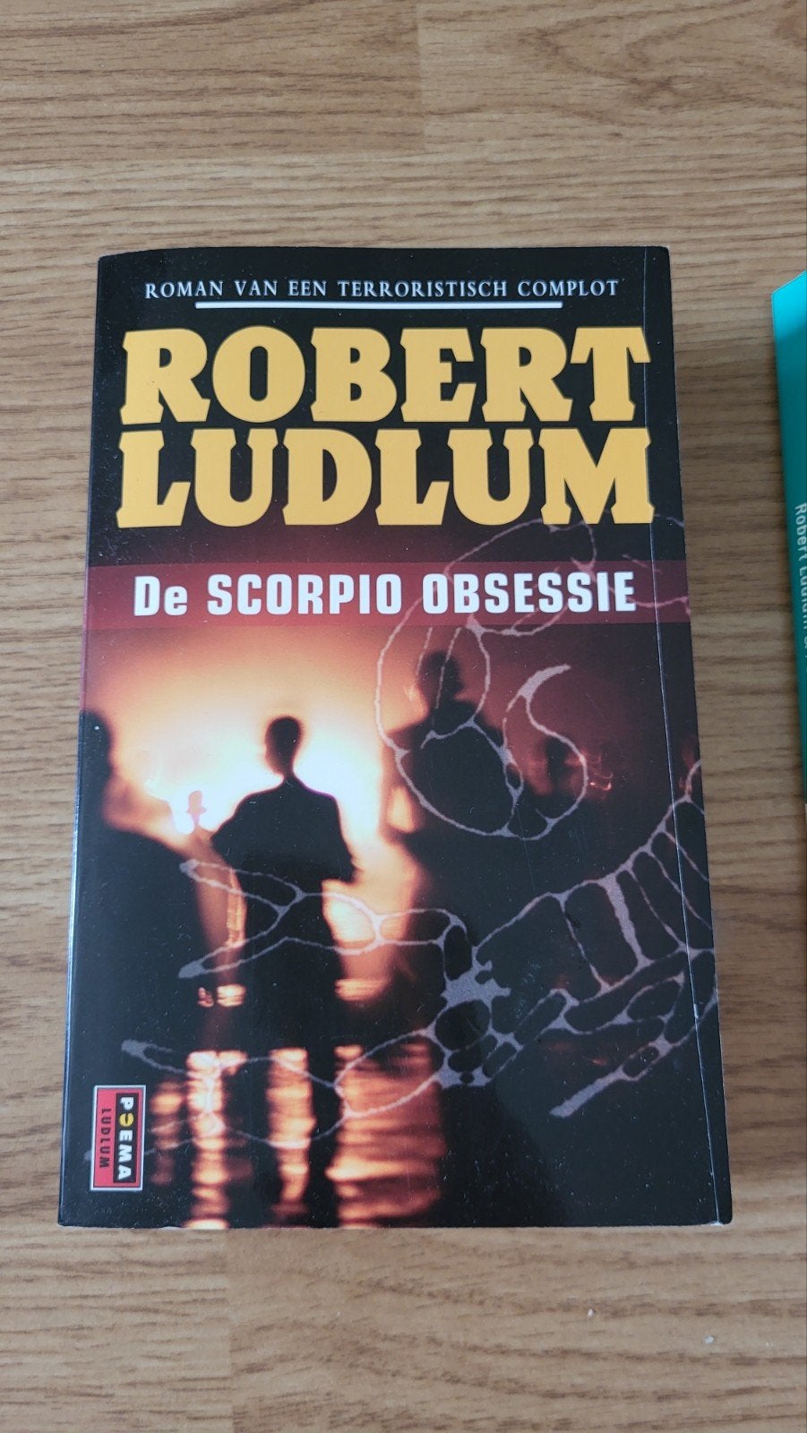 Robert Ludlum - De scorpio obsessie, Boeken, Ophalen of Verzenden, Zo goed als nieuw, Robert Ludlum