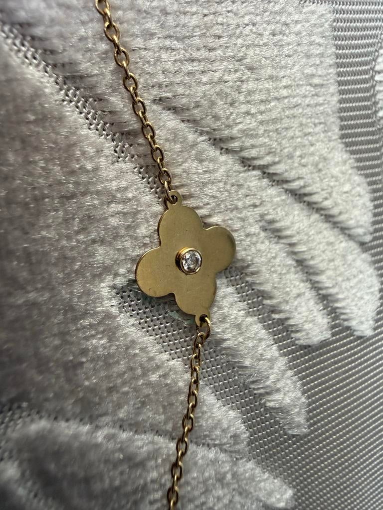 Gouden klavertje vier armband, Ophalen of Verzenden, Zo goed als nieuw, Goud, Met edelsteen