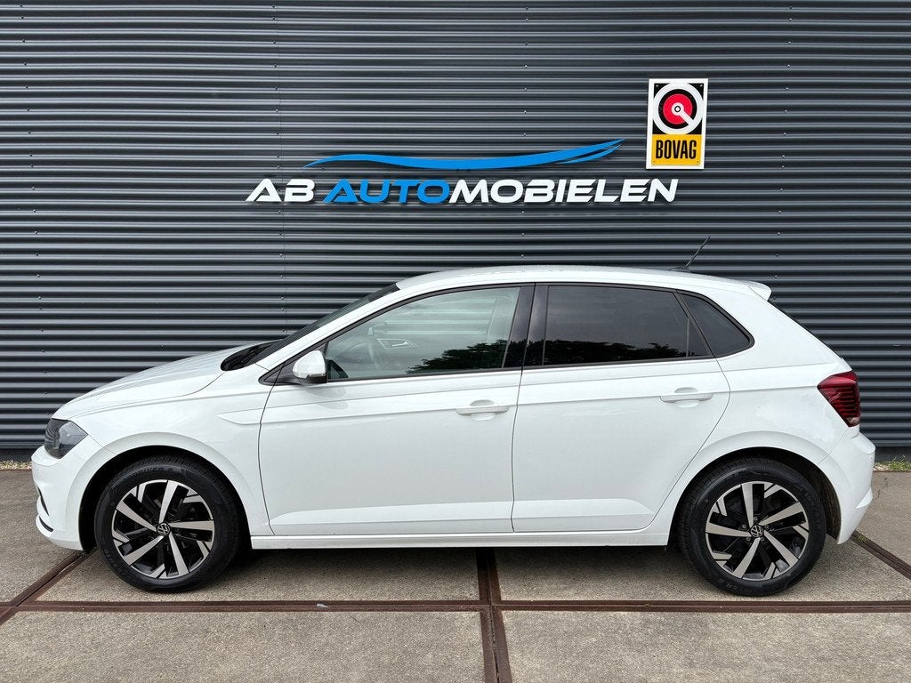 Volkswagen Polo 1.0 TSI Comfortline PARKEERSENSOREN/ CARPLAY, Voorwielaandrijving, Gebruikt, 95 pk, Met garantie (alle)