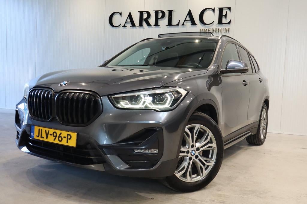 BMW X1 SDrive18i High Executive-Panoramadak-Automaat, Auto's, BMW, 136 pk, Gebruikt, Euro 6, Leder en Stof