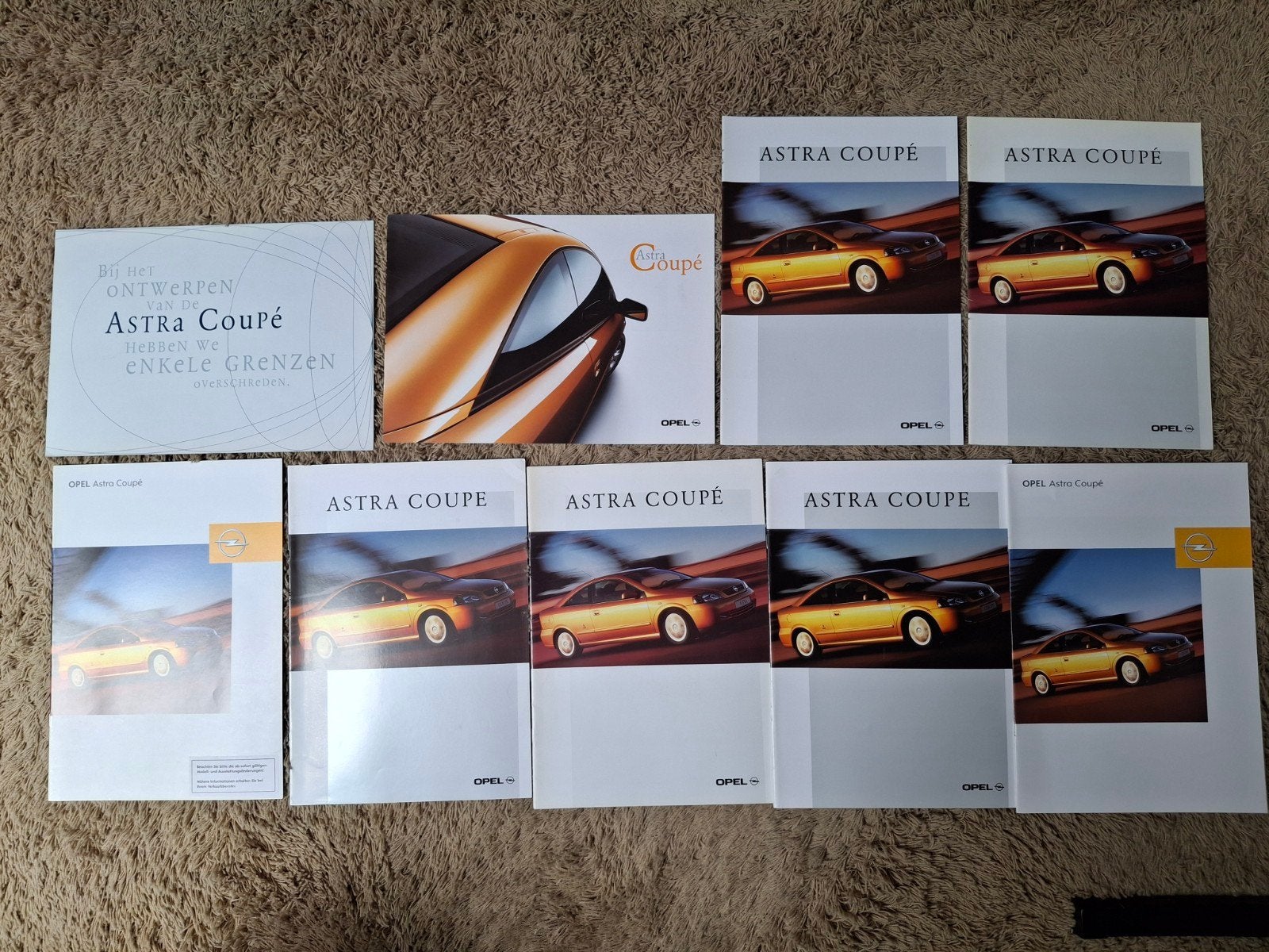 Lot autofolders Opel Astra B coupe, Verzenden, Opel