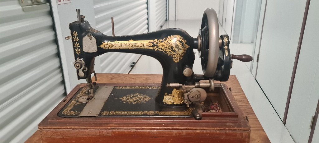 antieke Singer naaimachine, Ophalen