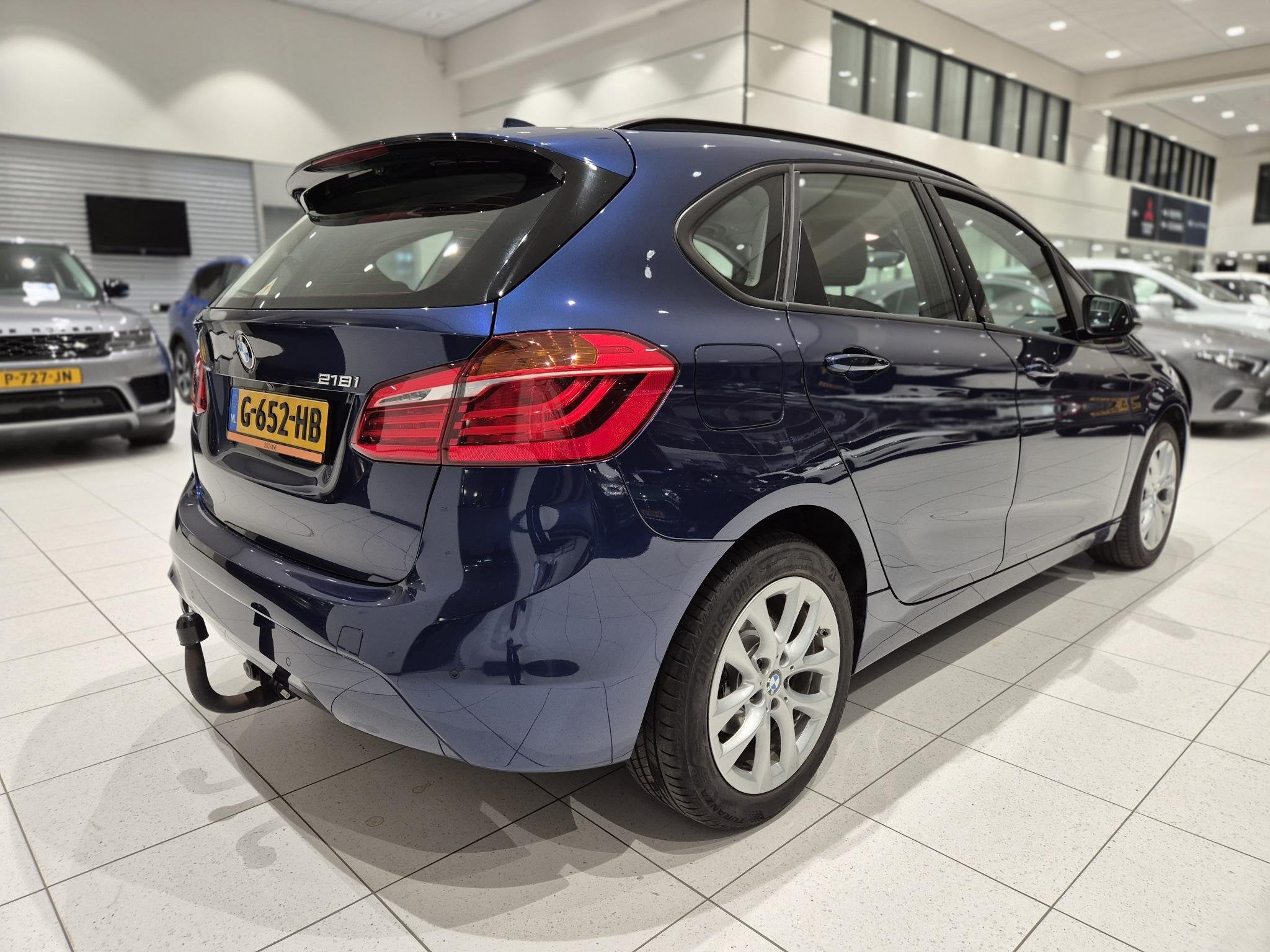 BMW 2-serie Active Tourer 218i High Executive Edition | Lede, Gebruikt, Blauw, Bedrijf, 3 cilinders