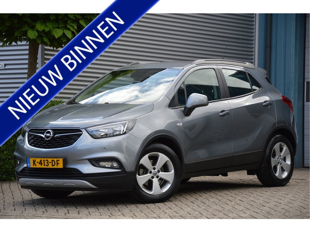 Opel Mokka X 1.4 Turbo 120 Jaar Edition NAVI | CAMERA | TREK, Auto's, Opel, Voorwielaandrijving, 12 maanden, Stof, Gebruikt