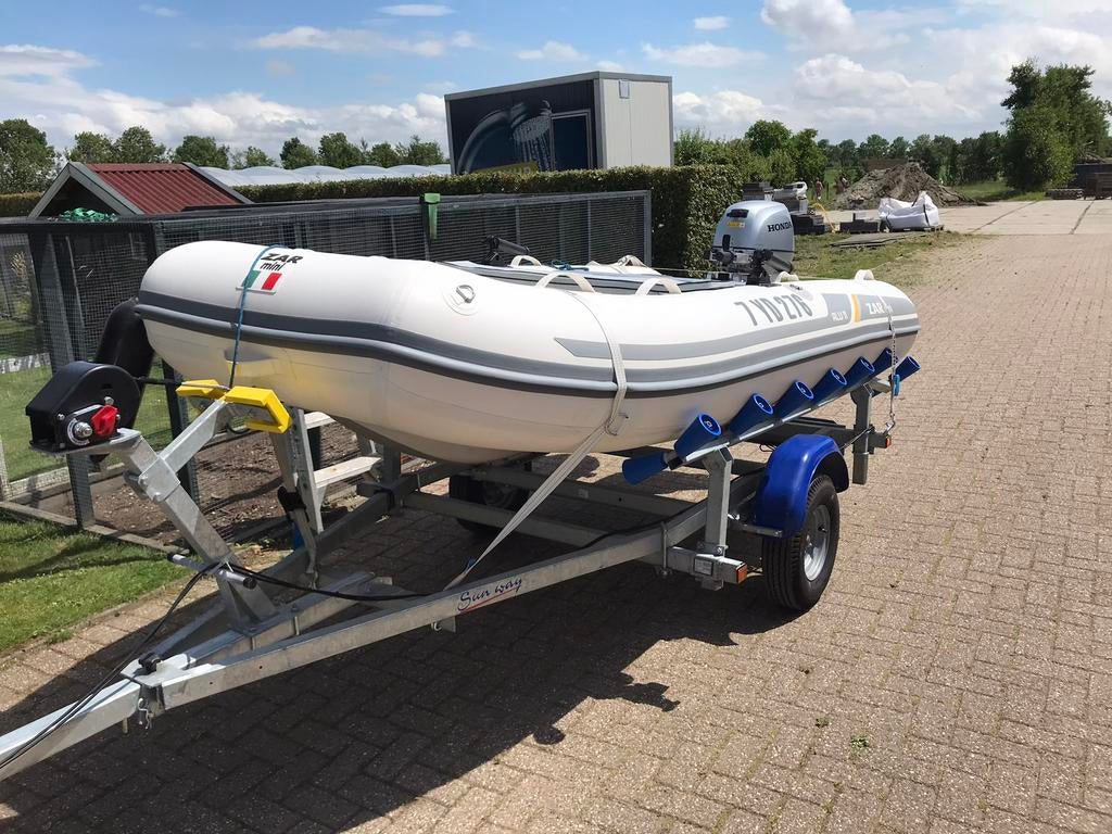 Rubberboot, met buitenboordmotor 15pk yamaha en trailer, Ophalen, Zo goed als nieuw