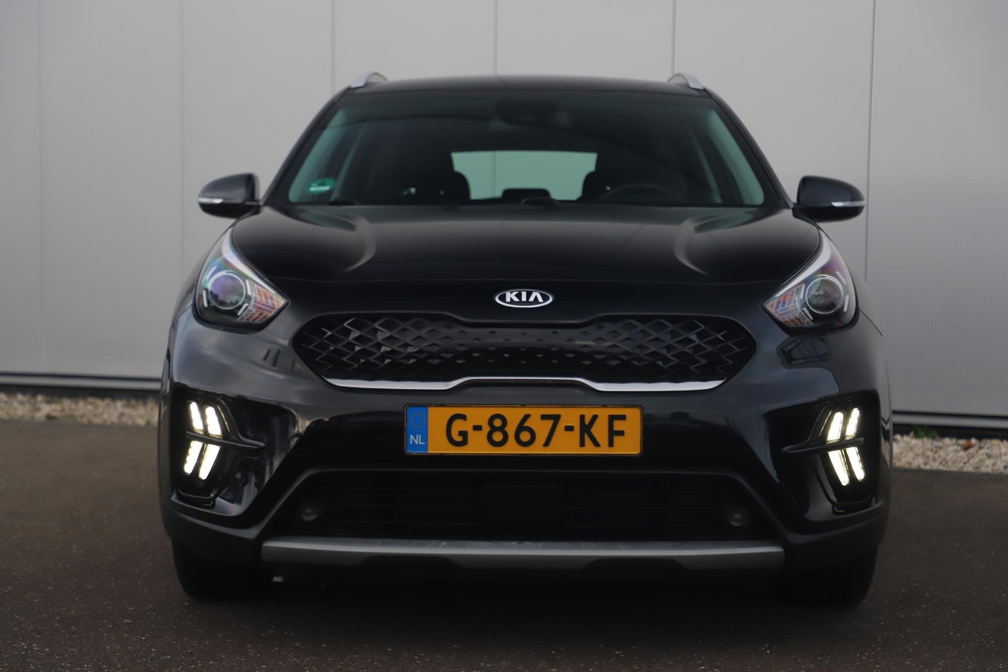Kia Niro 1.6 GDi Hybrid DynamicLine 140PK Automaat Half Lede, Auto's, Kia, Gebruikt, Euro 6, Leder en Stof, Zwart