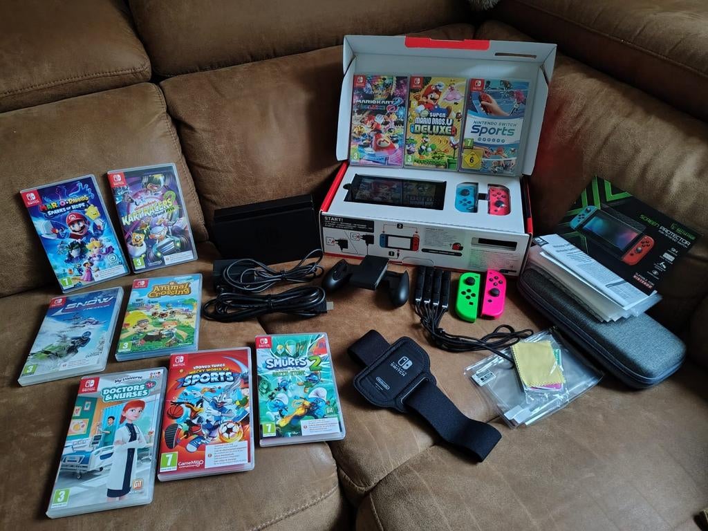 Nintendo Switch V2 met 10 spellen en accessoires, Spelcomputers en Games, Avontuur en Actie, Ophalen of Verzenden, Zo goed als nieuw