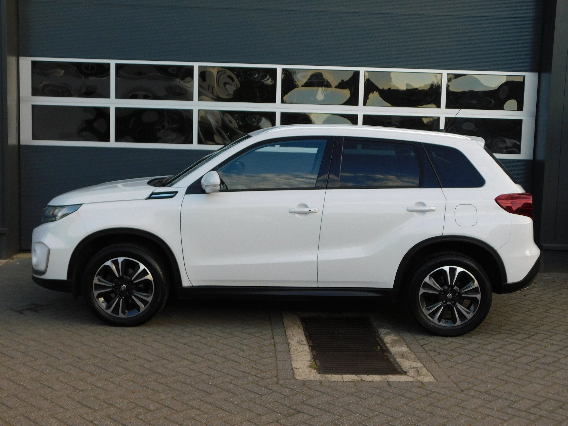 Suzuki Vitara 1.4 Boosterjet Style Smart Hybrid (bj 2021), 12 maanden, Gebruikt, Euro 6, 4 cilinders