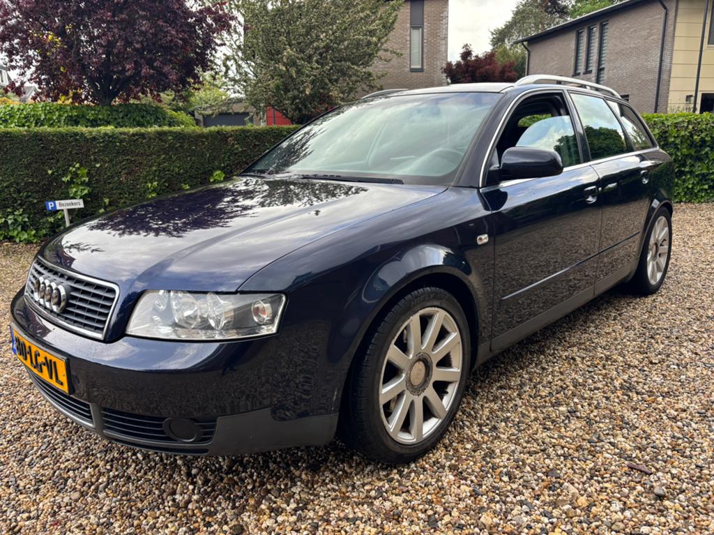 Audi A4 1.8 T Avant Quattro 120KW EXCLUSIVE, 1490 kg, Zwart, 4 cilinders, Blauw