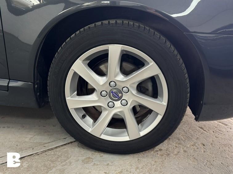 Volvo V70 1.6 T4 Nordic+, Zwart, 4 cilinders, Automatische klimaatregeling, 1600 kg