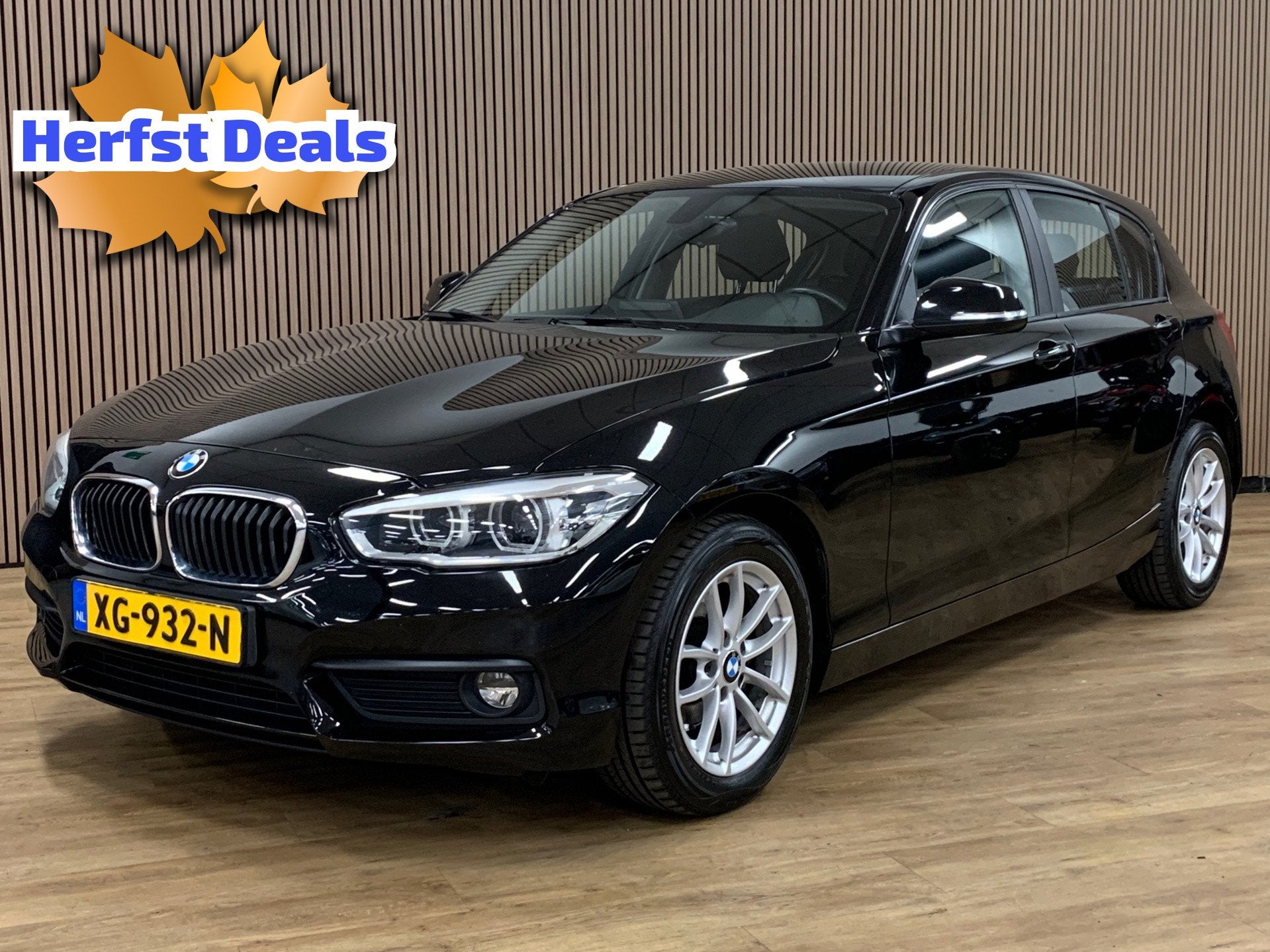 BMW 1-serie 118i Executive|Automaat|Navigatie|Climate Contro, Auto's, Dealer onderhouden, Gebruikt, Zwart, Origineel Nederlands