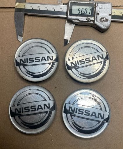 56mm Nissan naafdoppen - Set van 4, Auto diversen, Ophalen of Verzenden, Gebruikt