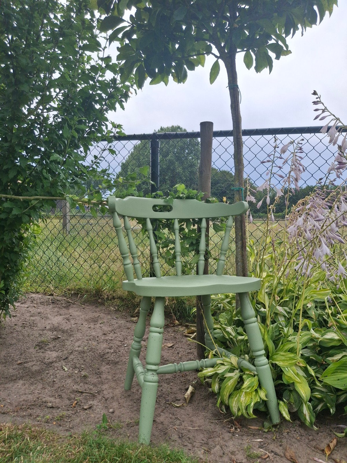 Unieke  spijlenstoel., Ophalen
