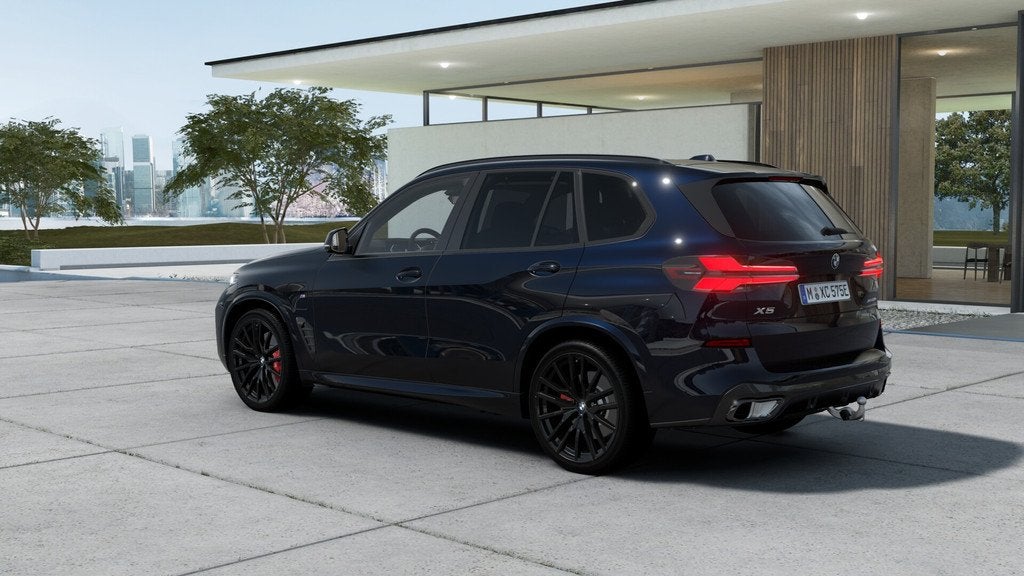 BMW X5 xDrive50e M Sport Automaat / Panoramadak Sky Lounge /, Auto's, BMW, Automaat, 2395 kg, Zwart, Leder