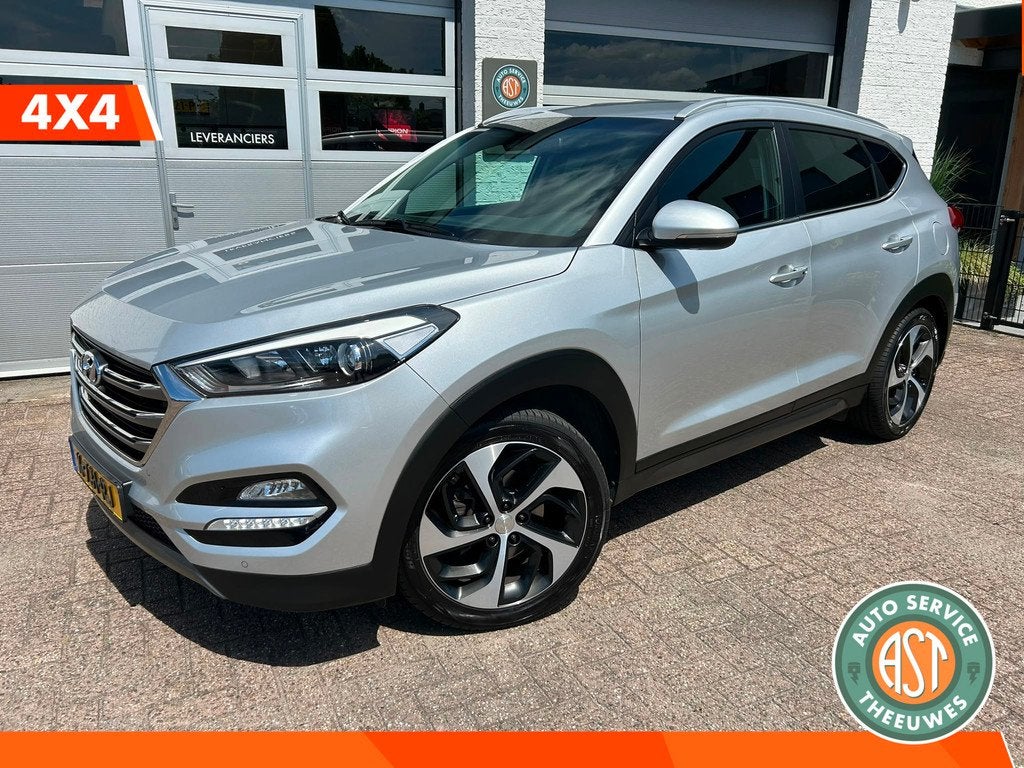Hyundai Tucson 1.6 T-GDi Comfort 4WD LPG|LEER|NAVI|STOELVERW, Auto's, Hyundai, Gebruikt, 4 cilinders, Leder, Bedrijf
