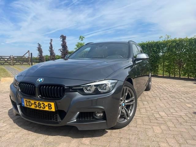 BMW 3-Serie 318i 136pk Aut 2019 Grijs, Automaat, 1465 kg, Particulier, 3 cilinders