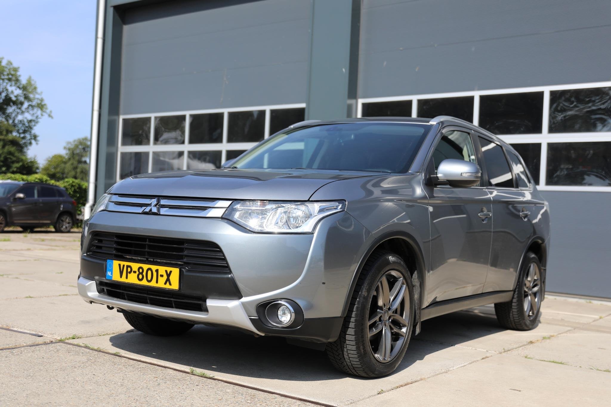 Mitsubishi Outlander 2.2 DI-D Business Edition 4WD | Grijs k, Auto's, Mitsubishi, Euro 5, 4 cilinders, Leder en Stof, Origineel Nederlands