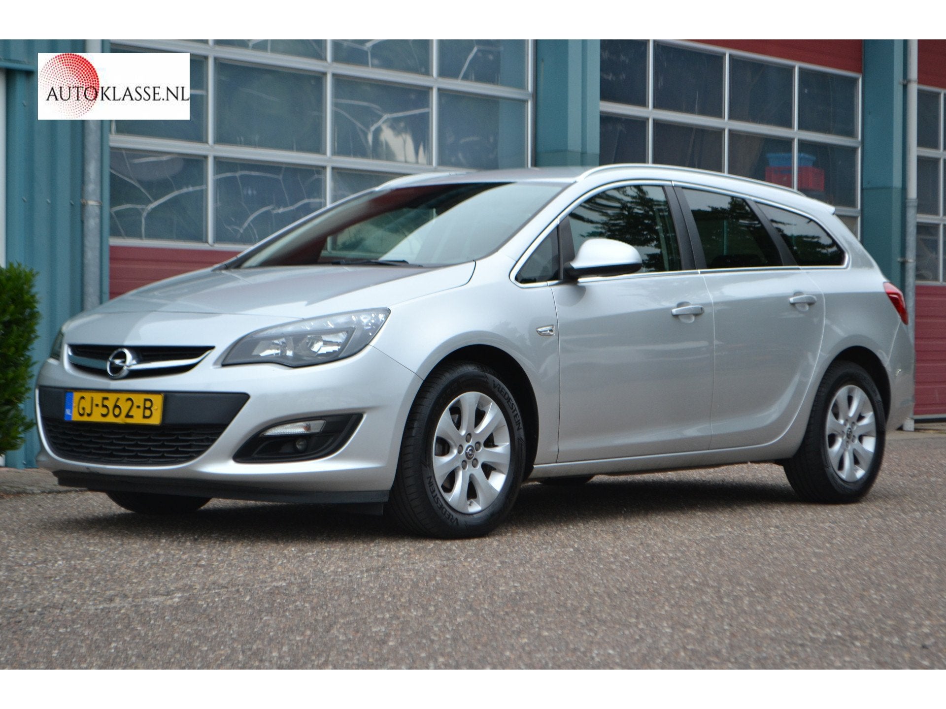 Opel Astra Sports Tourer 1.4 Turbo Edition (bj 2015), Voorwielaandrijving, Dealer onderhouden, Stof, Gebruikt