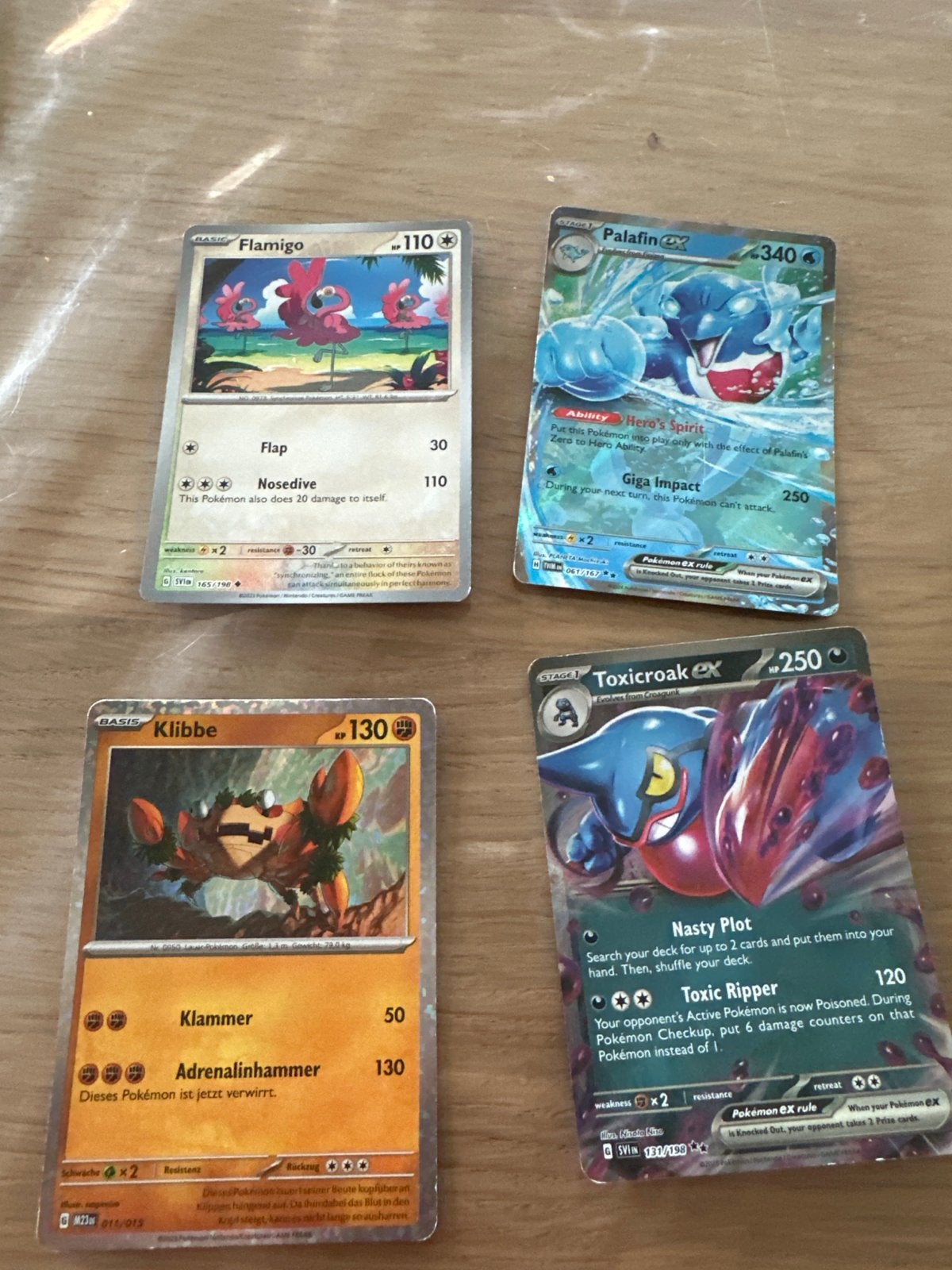 4 Pokémon kaarten - Palafin, Toxicroak, Flamigo, Klibbe, Ophalen of Verzenden, Gebruikt, Meerdere kaarten