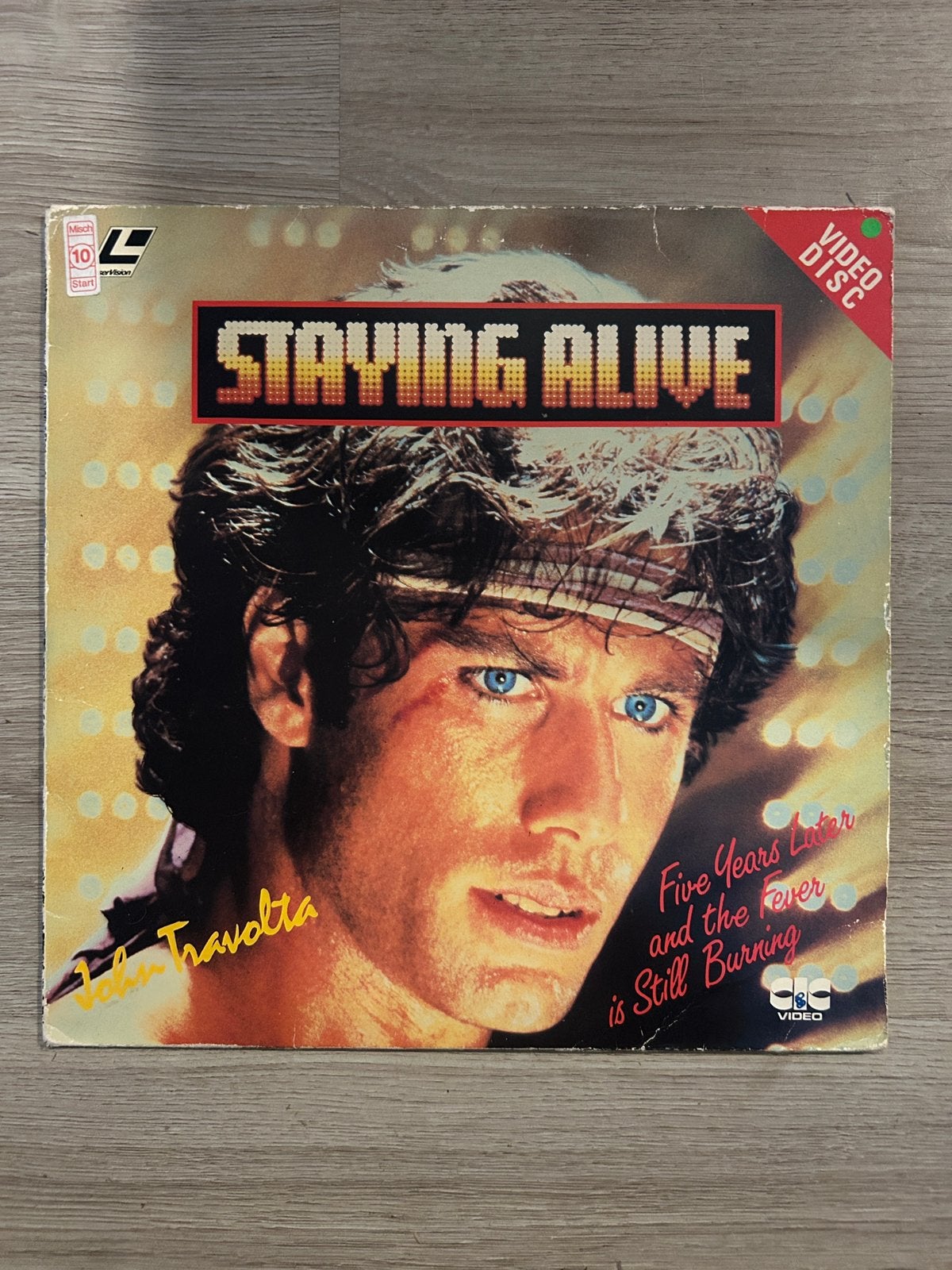 Laserdisc / Laservision John Travolta - Staying Alive, Ophalen of Verzenden, Zo goed als nieuw, Foto of Kaart