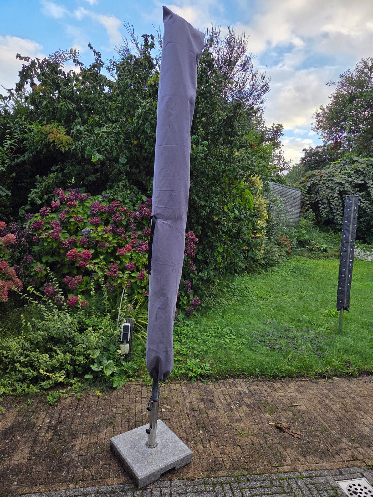 Parasol met verzwaarde voet