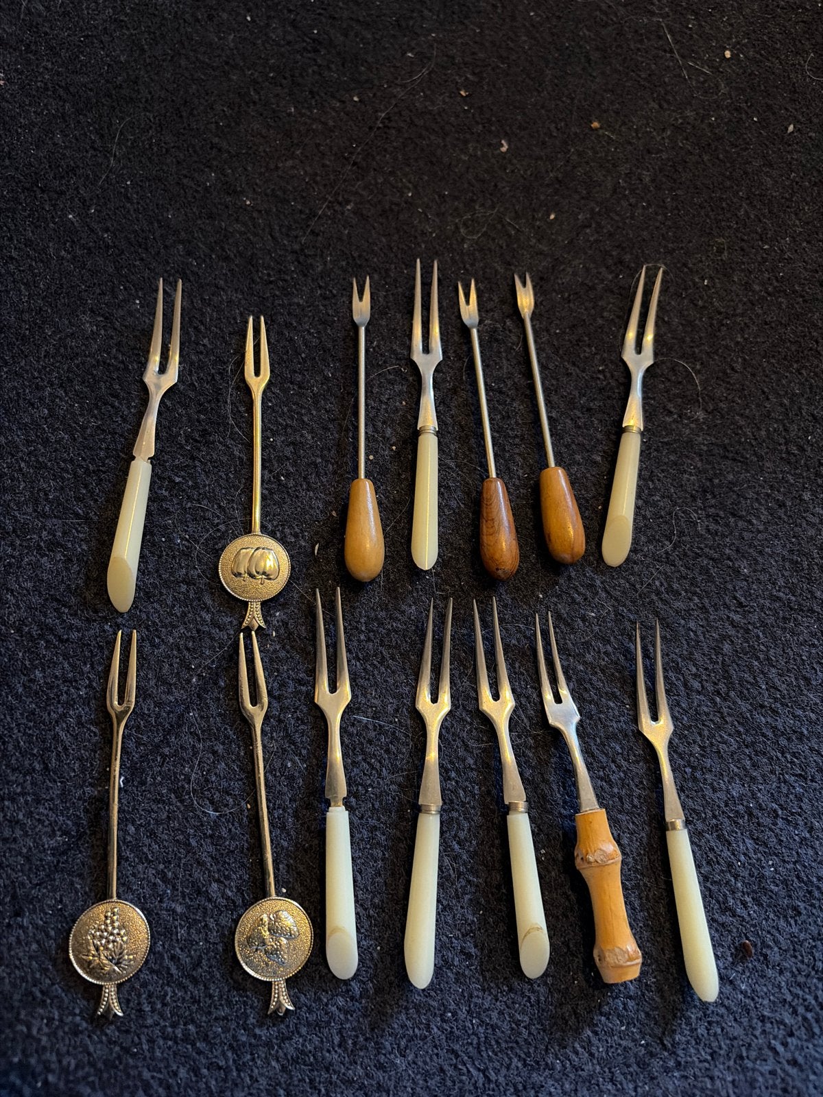 Set van 14 antieke cocktailvorkjes/prikkers, Ophalen