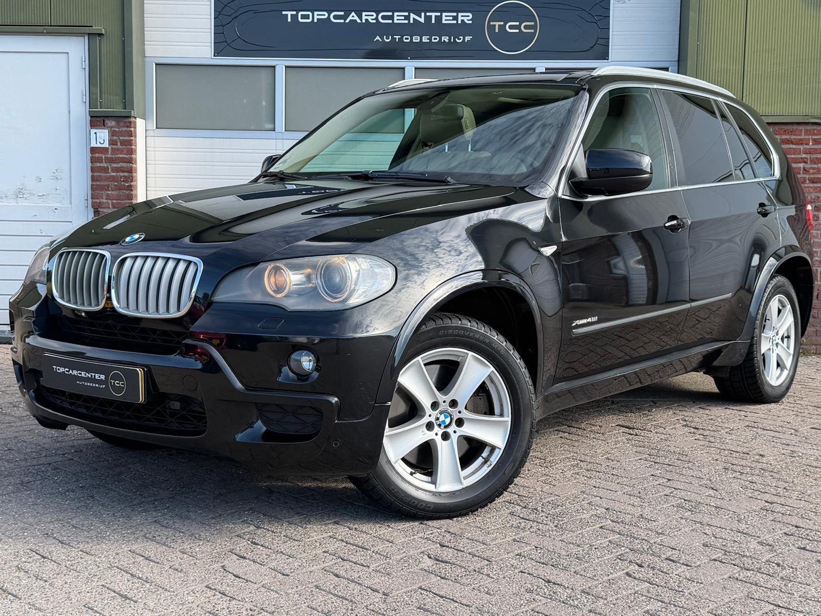 BMW X5 xDrive48i High Executive/PANO/TREKH/PARKS/NAVI/APK, Auto's, Gebruikt, 138 €/maand, Zwart, Leder