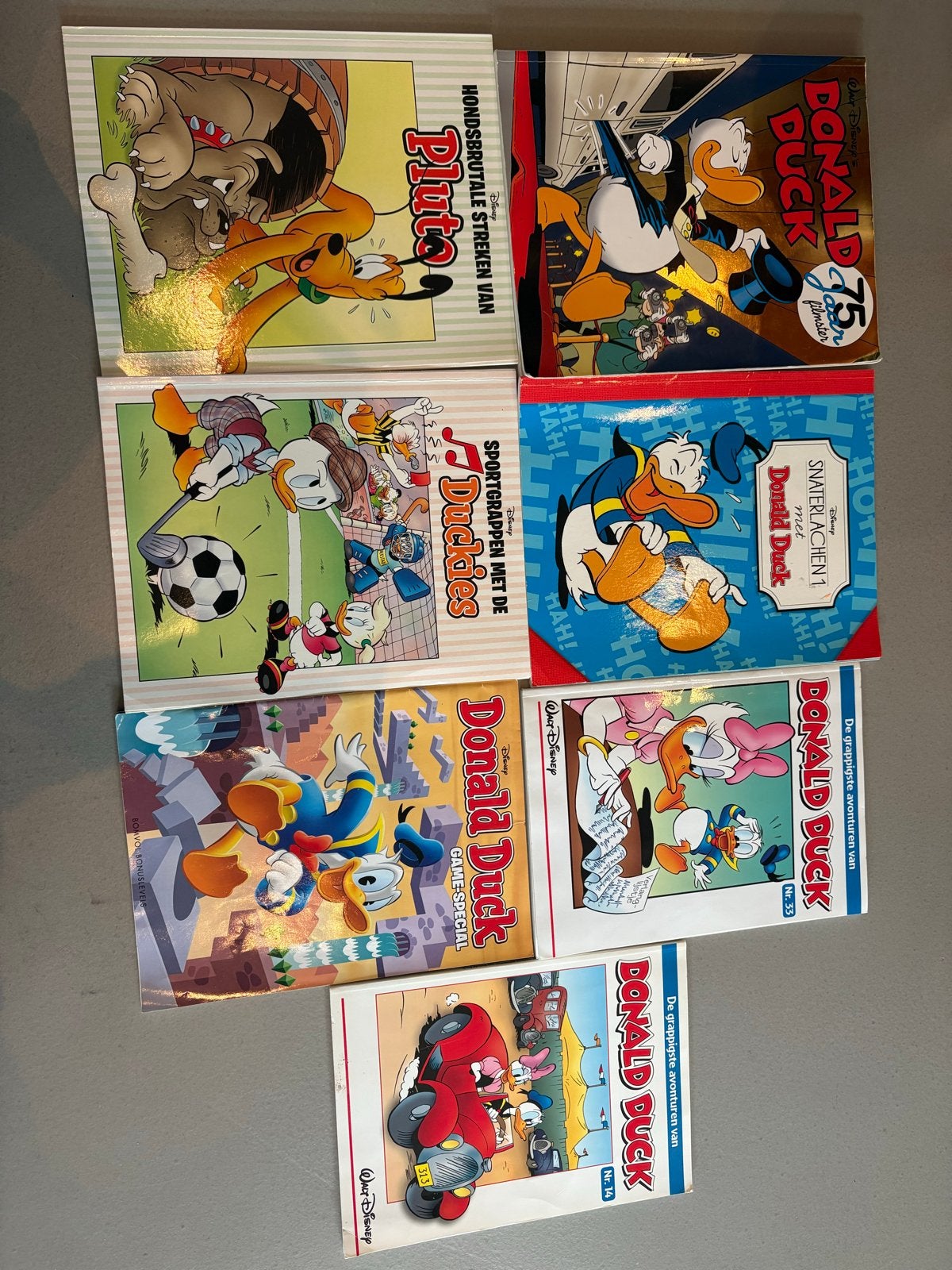 Donald Duck en Pluto stripboeken - 7 stuks, Meerdere stripboeken, Ophalen, Gelezen