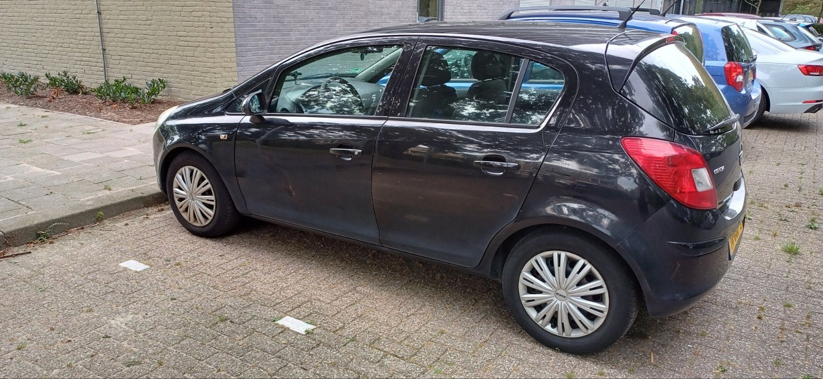 Te koop Opel Corsa 1.2 Enjoy, Auto's, Zwart, Overige kleuren, Particulier, Corsa