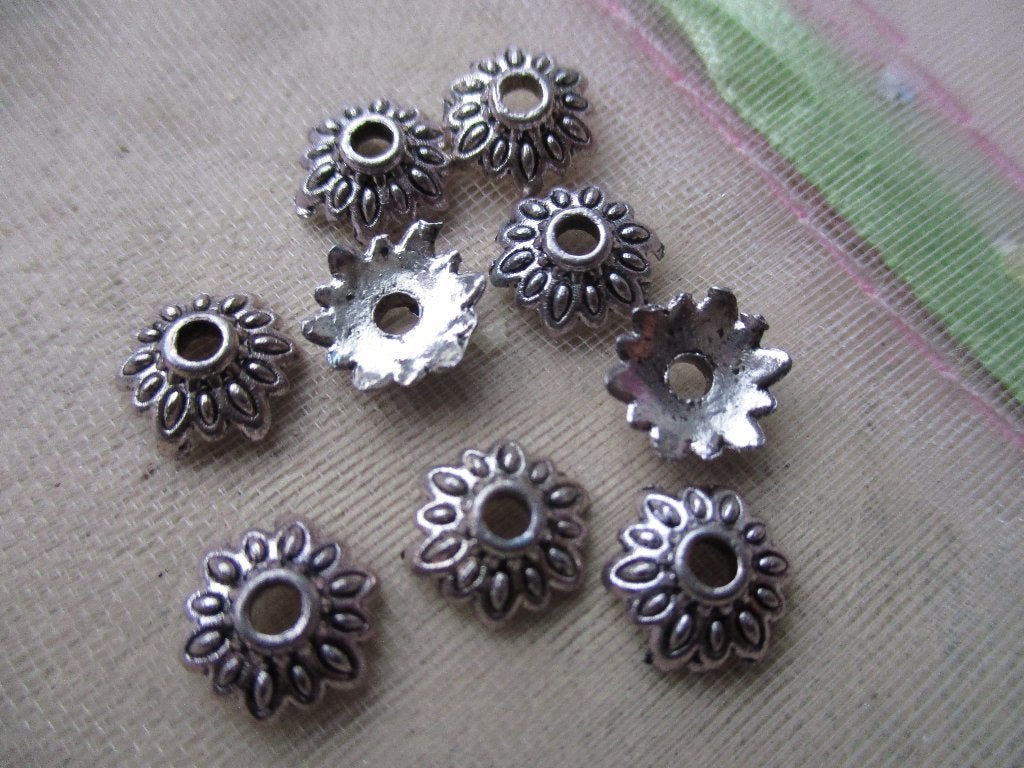 459/ tibetiaans zilveren bloem kralenkapjes, Ophalen of Verzenden, Nieuw, Overige typen