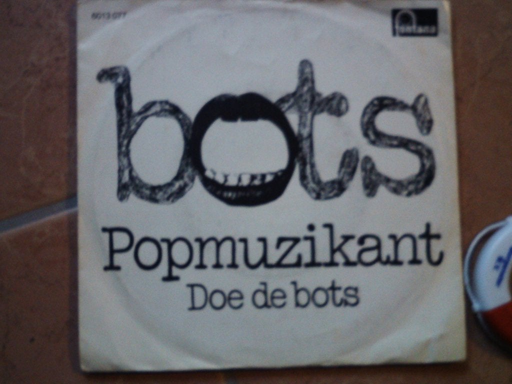 bots -- popmuzikant /// doe de bots  16o, 7 inch, Ophalen of Verzenden, Zo goed als nieuw, Beschermende buitenhoes