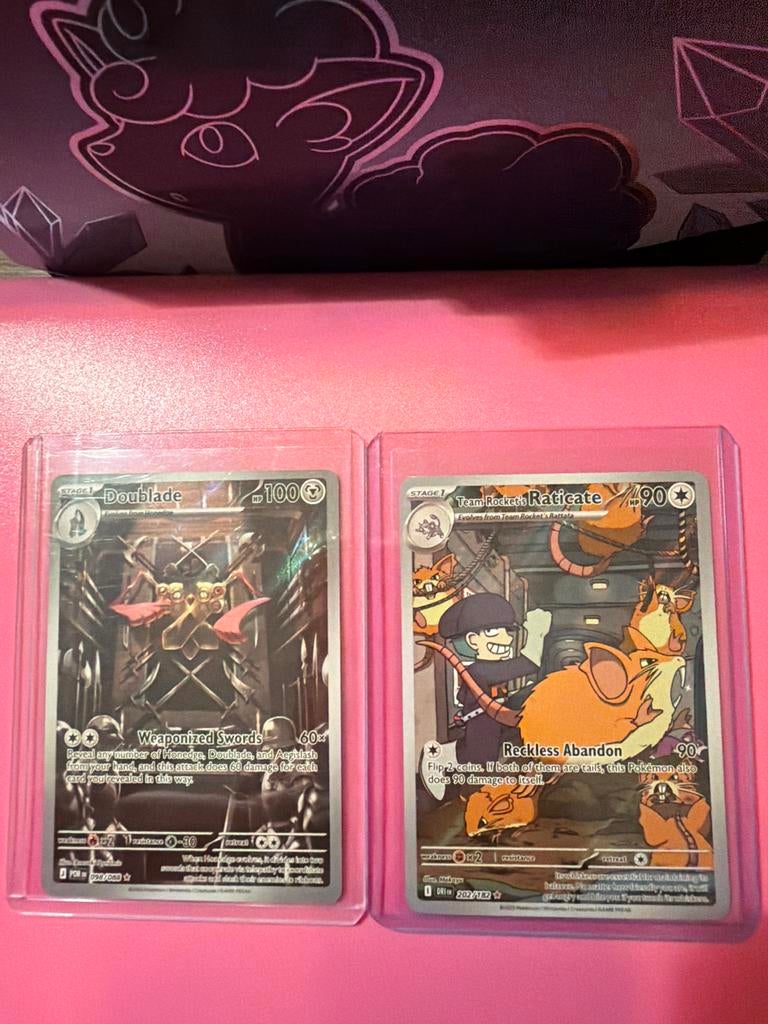 Pokémon TCG: Doublade 098/088 & Team Rocket's Raticate 202/1, Ophalen of Verzenden, Zo goed als nieuw, Meerdere kaarten, Foil