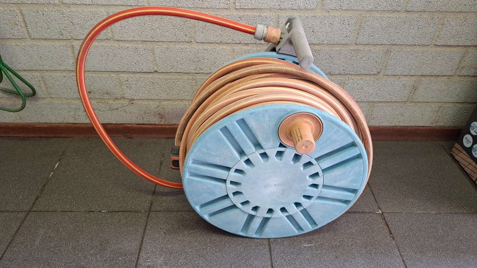 Tuinslang op haspel., Tuin en Terras, Tuinslangen, Ophalen, Gebruikt, Tuinslang