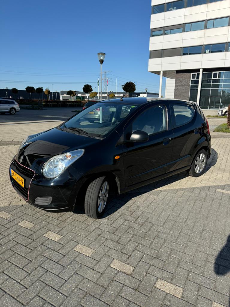 Suzuki Alto 1.0 2012 Zwart, Auto's, Voorwielaandrijving, Euro 5, Stof, Metallic lak