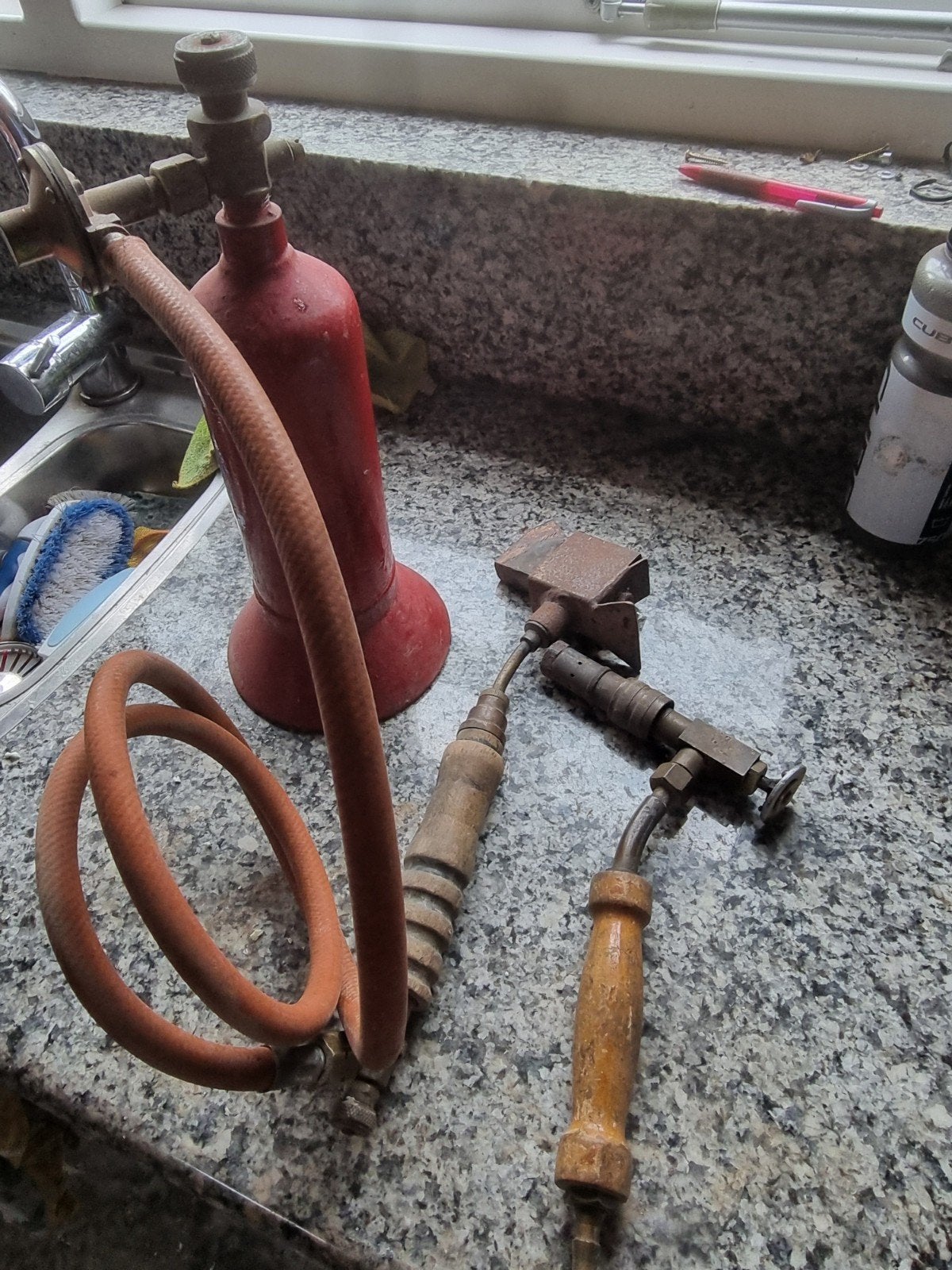 Gasflesje  met bout en brander, Ophalen