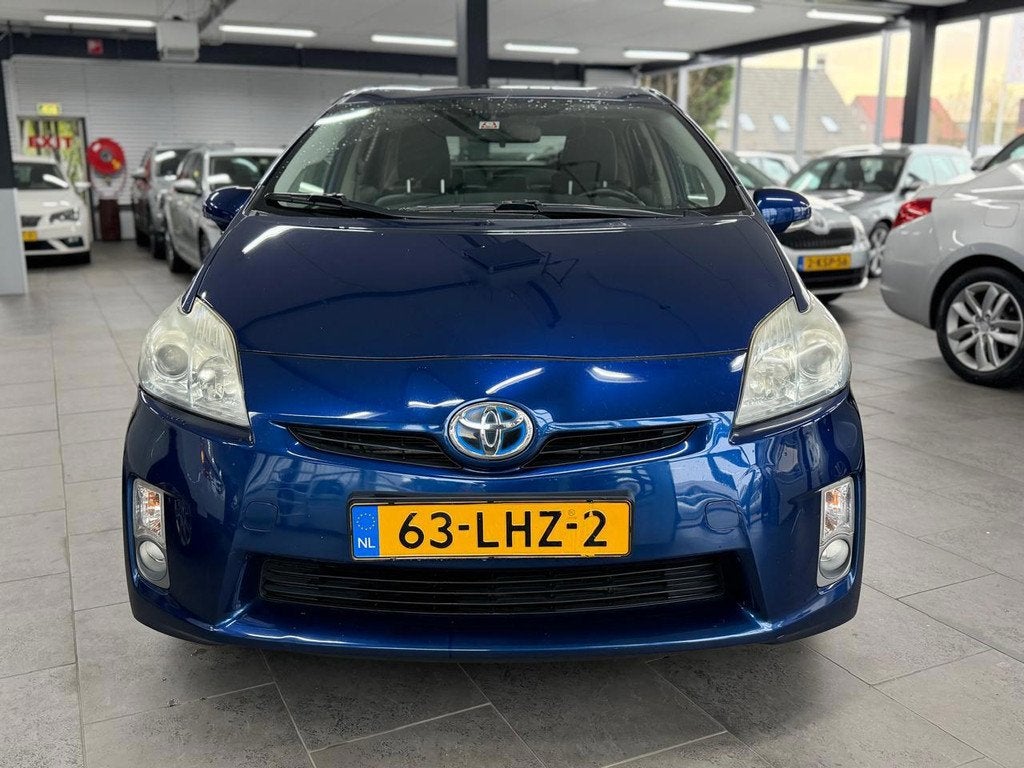 Toyota Prius 1.8 Aspiration 1-eigenaar clima cruise control, Auto's, Toyota, Stof, Gebruikt, 4 cilinders, Blauw