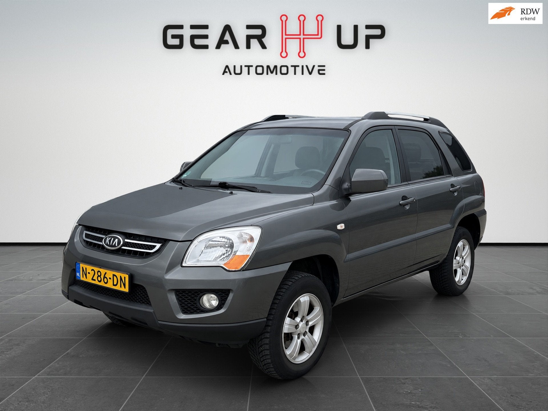 Kia Sportage 2.0 CVVT X-clusive AIRCO|CRUISE|LEER|LM|TREKH|, Auto's, 1442 kg, Gebruikt, 4 cilinders, Leder