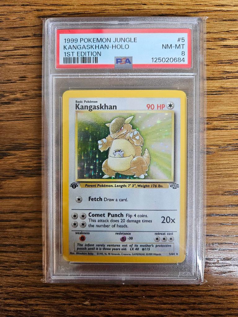 Pokemonkaarten - Kangaskan 5/64 jungle 1st edition PSA 8, Verzenden, Zo goed als nieuw, Losse kaart, Foil
