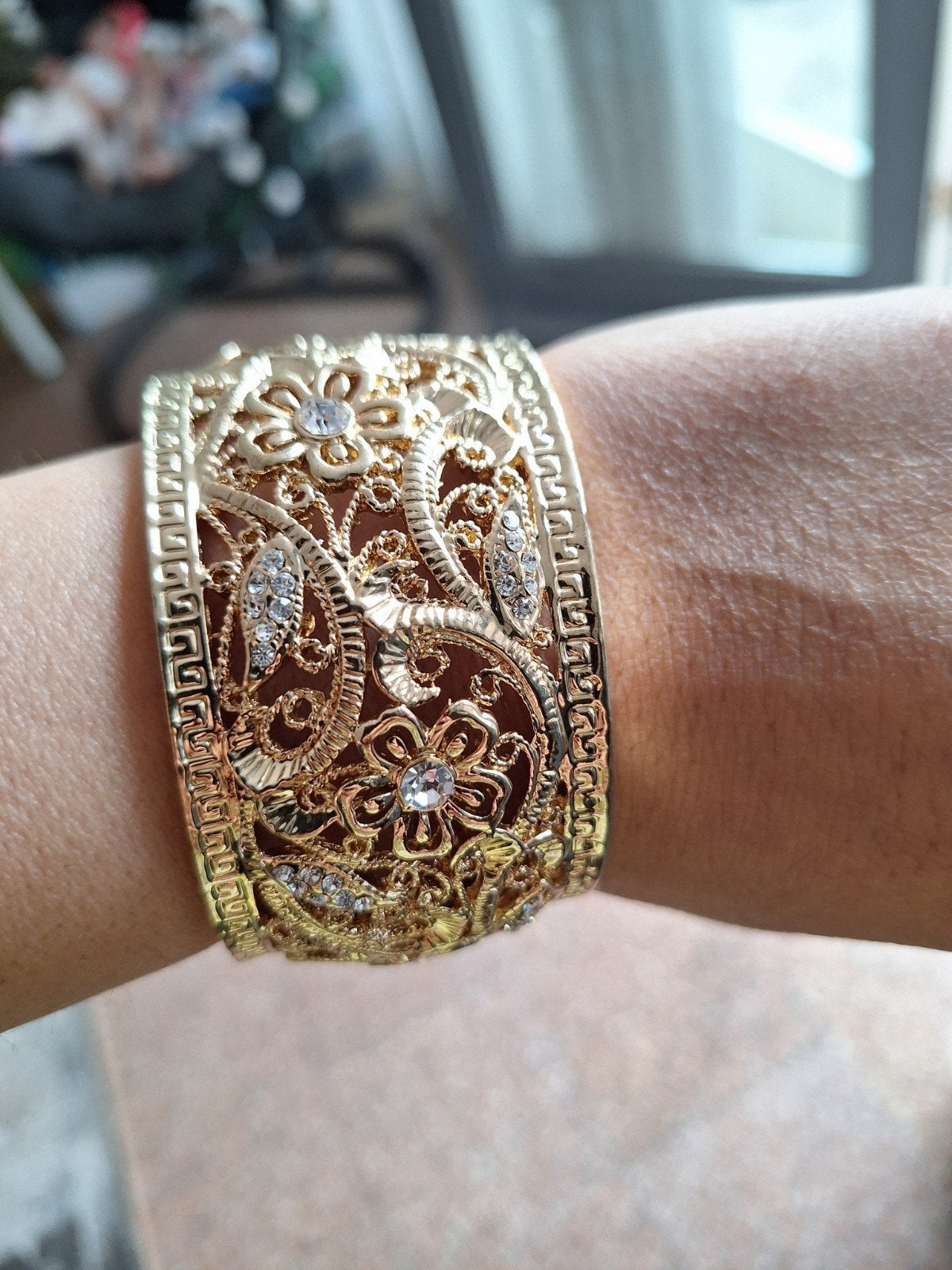 armband met strass en bloemmotief, Overige materialen, Ophalen of Verzenden, Zo goed als nieuw, Goud