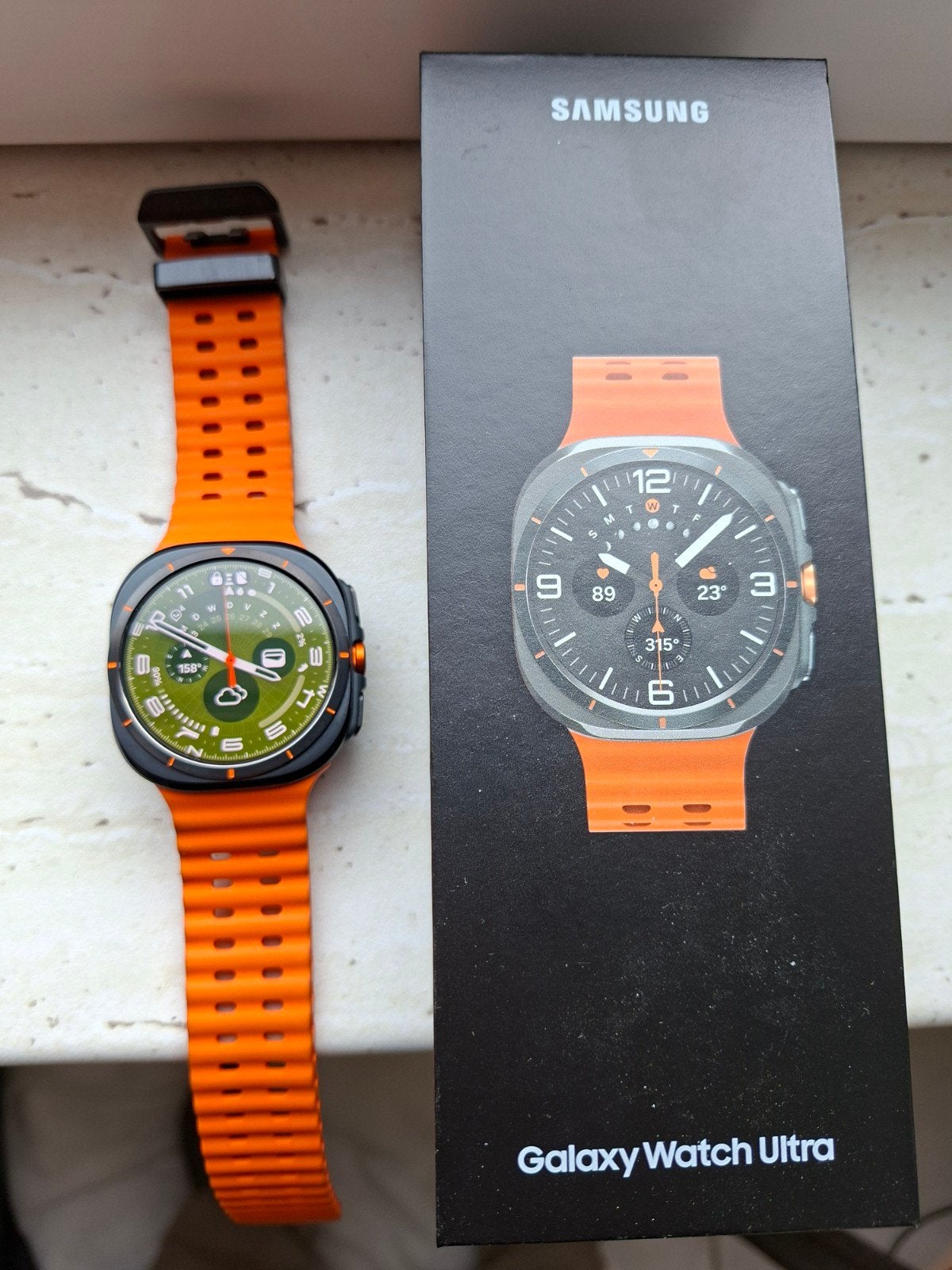 Samsung Galaxy Watch Ultra 47mm Oranje Bandje, Sieraden, Tassen en Uiterlijk, Smartwatches, Oranje, Ophalen of Verzenden, Zo goed als nieuw