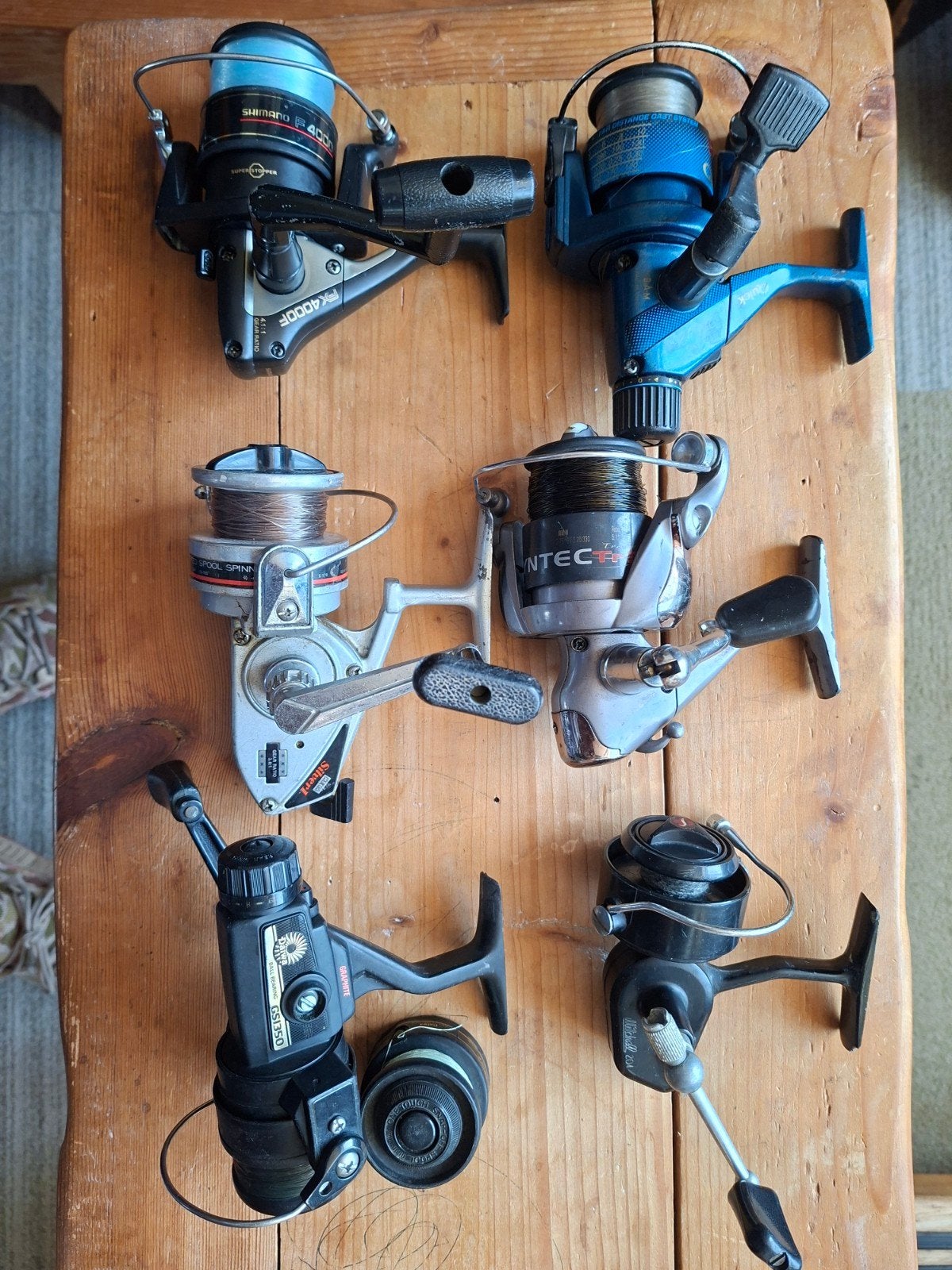 Partij oude vismolens, Shimano FX4000F en Mitchell 204, Watersport en Boten, Ophalen of Verzenden, Gebruikt, Molen