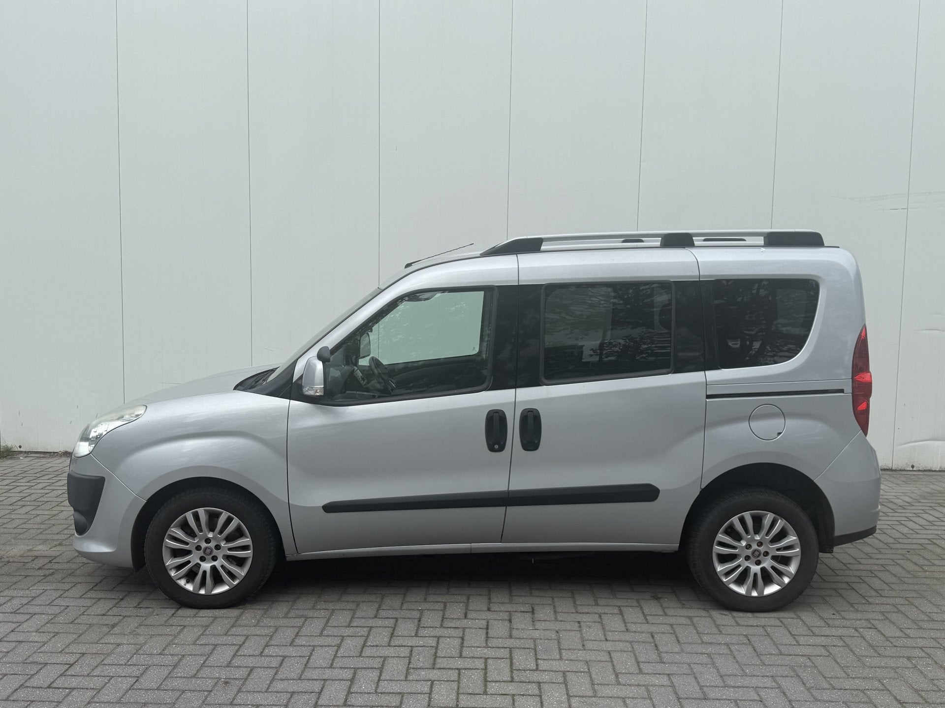 Fiat Doblò 1.4 T-Jet 120pk Rolstoelauto 3+1 - XXL Freedom B, Auto's, Voorwielaandrijving, Gebruikt, Doblo, Met garantie (alle)