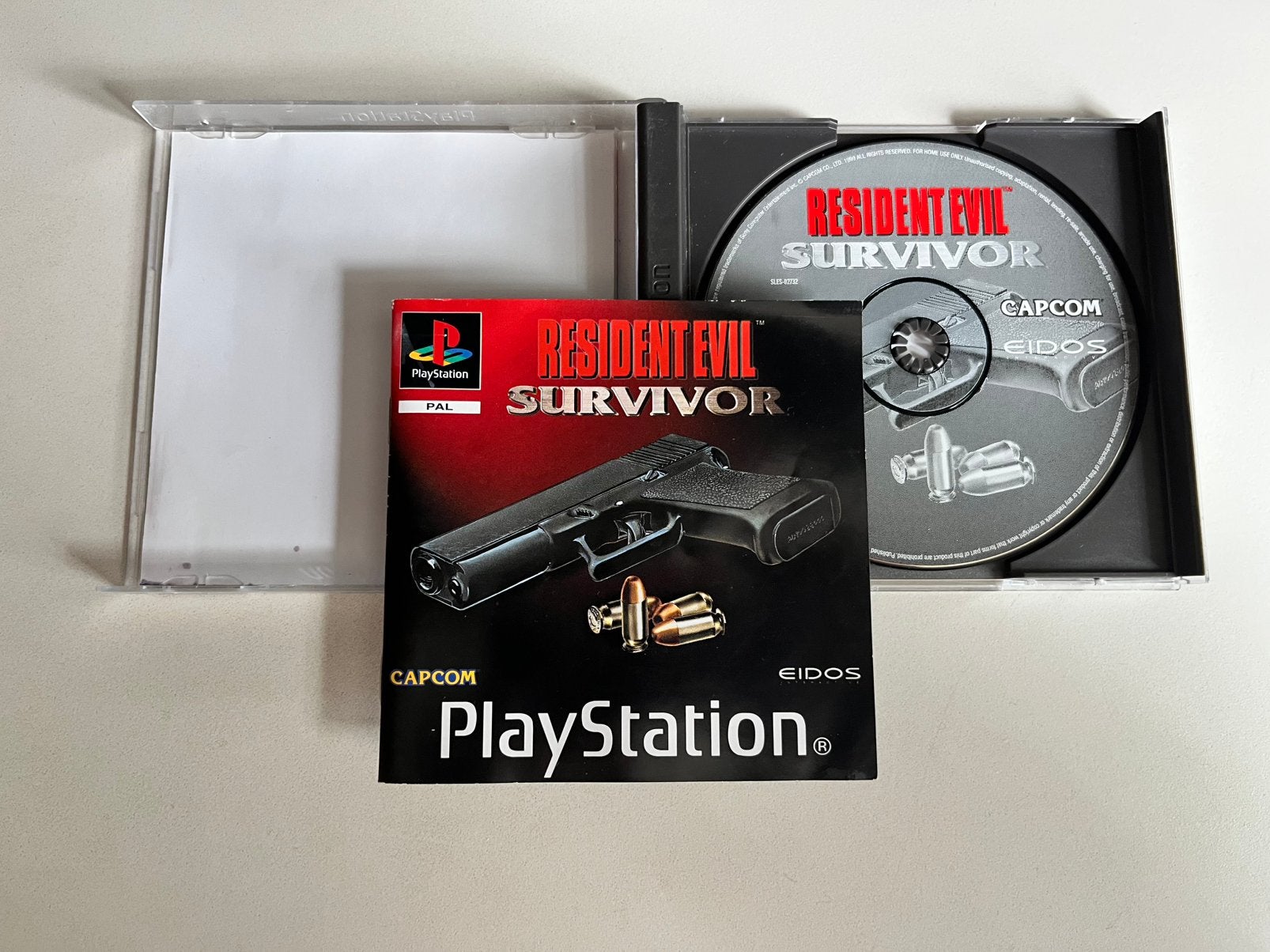 Resident Evil Survivor PlayStation 1 (PS1) - Compleet, Spelcomputers en Games, Games | Sony PlayStation 1, Gebruikt, Shooter, 1 speler