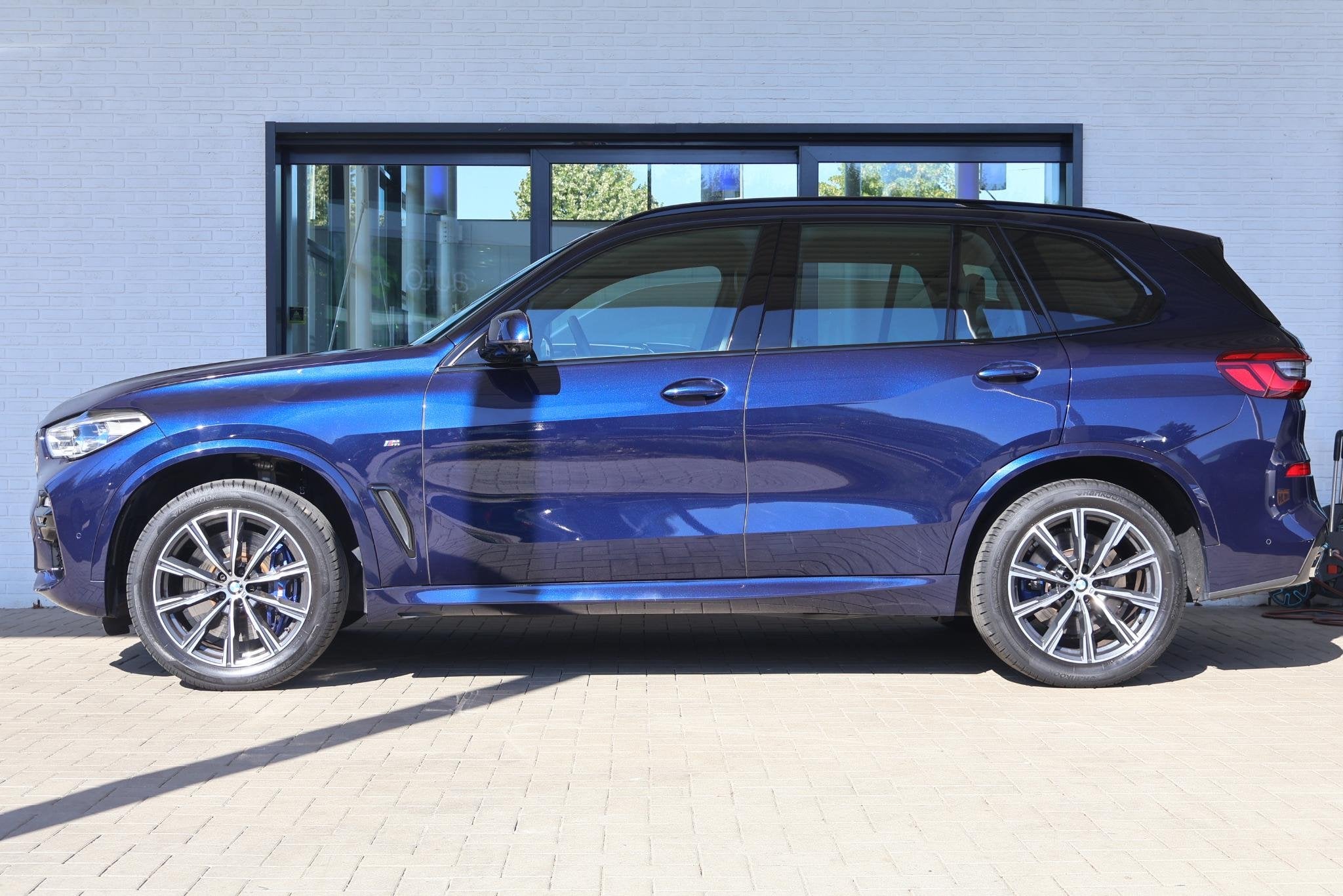 BMW X5 xDrive40i High Executive head-up display | Panoramada, Auto's, Automaat, Gebruikt, Met garantie (alle), Blauw