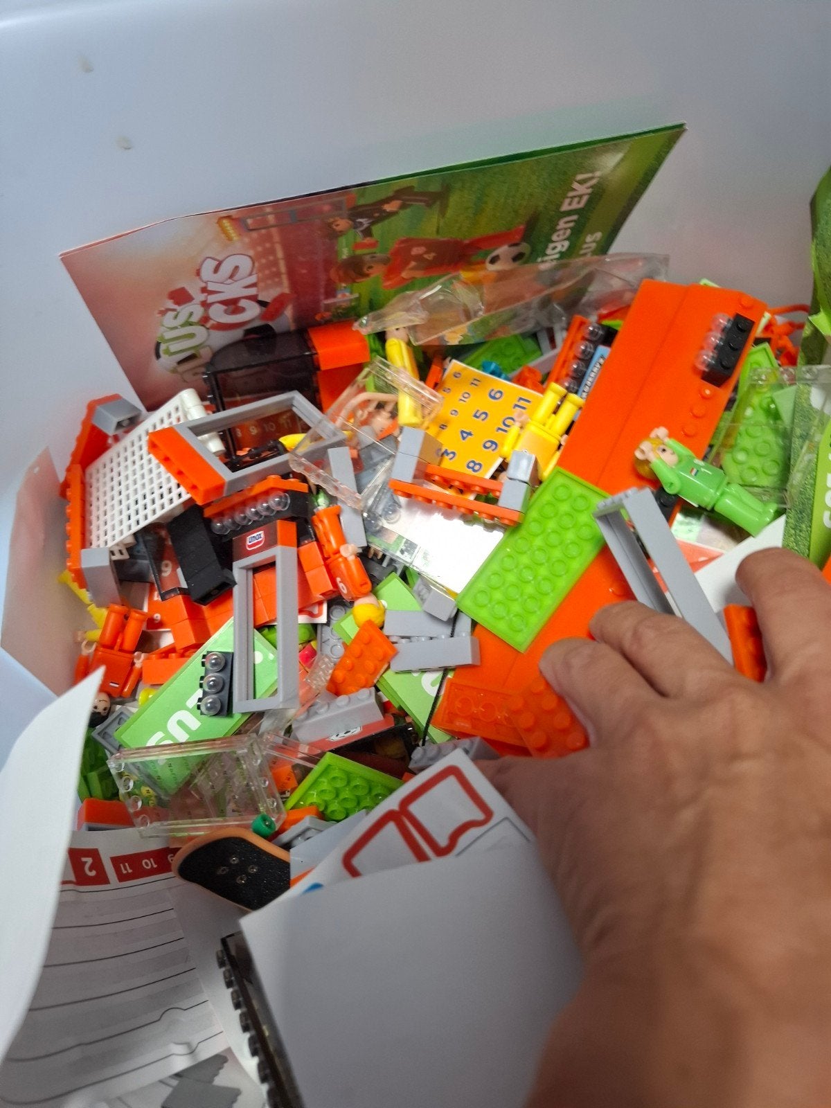 plus bricks bouw je eigen ek, Plus, Ophalen