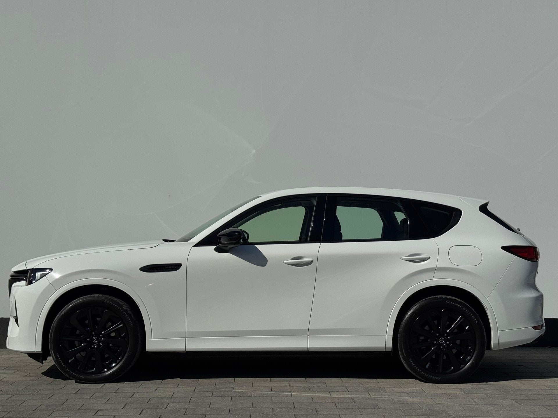 Mazda CX-60 2.5 e-SkyActiv PHEV 327pk Homura | Trekhaak | 2., Auto's, Mazda, 12 maanden, Gebruikt, 4 cilinders, Wit